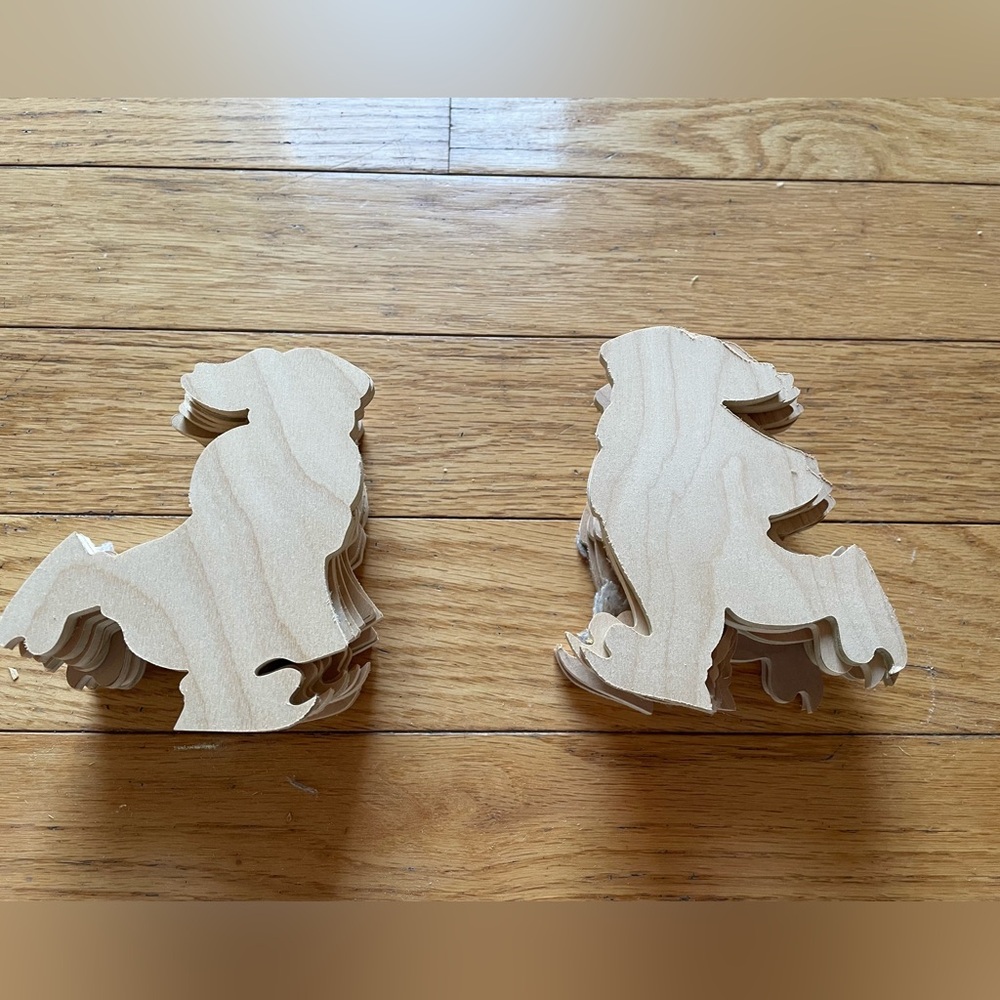 Wood cut out skating rabbits.